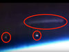 国際宇宙ステーションが2機の小型UFOと巨大“葉巻型”母艦を激撮! 専門家「明らかにNASAが画質を落としている」